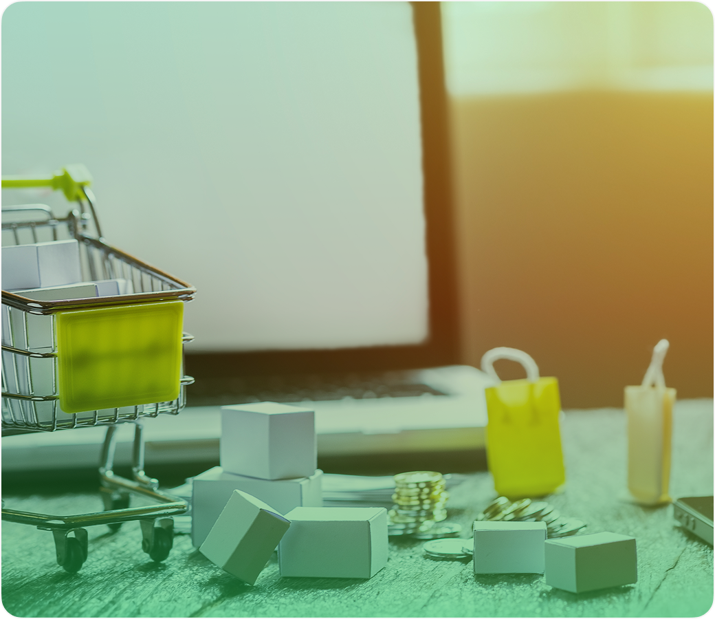 Boxes, bottles, and a barcode scanner on a desk with sunlight in the background